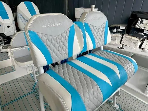 Slide: The Image of 2019 Concept 27' Open Deck boat seats with blue, white, and gray upholstery. - 14