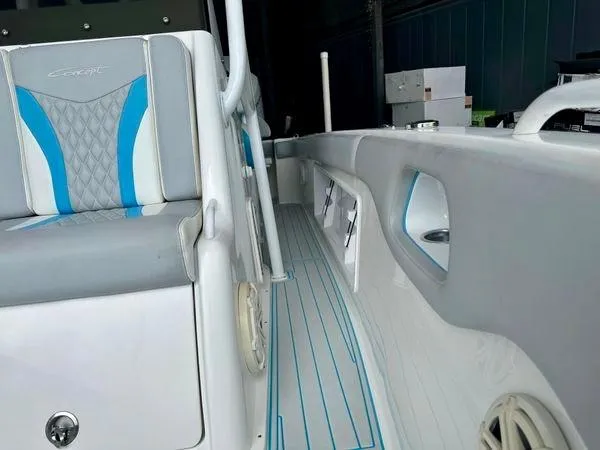 Slide: The Image of 2019 Concept 27' Open Deck boat interior with blue and gray seating. - 7
