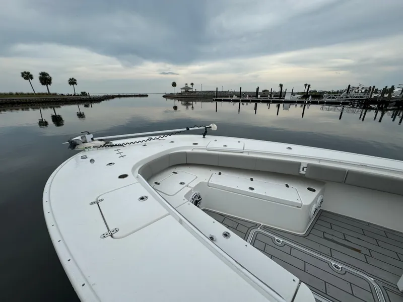 Slide: The Image of 2017 Cape Horn 36 XS boat on calm water with cloudy sky. - 11
