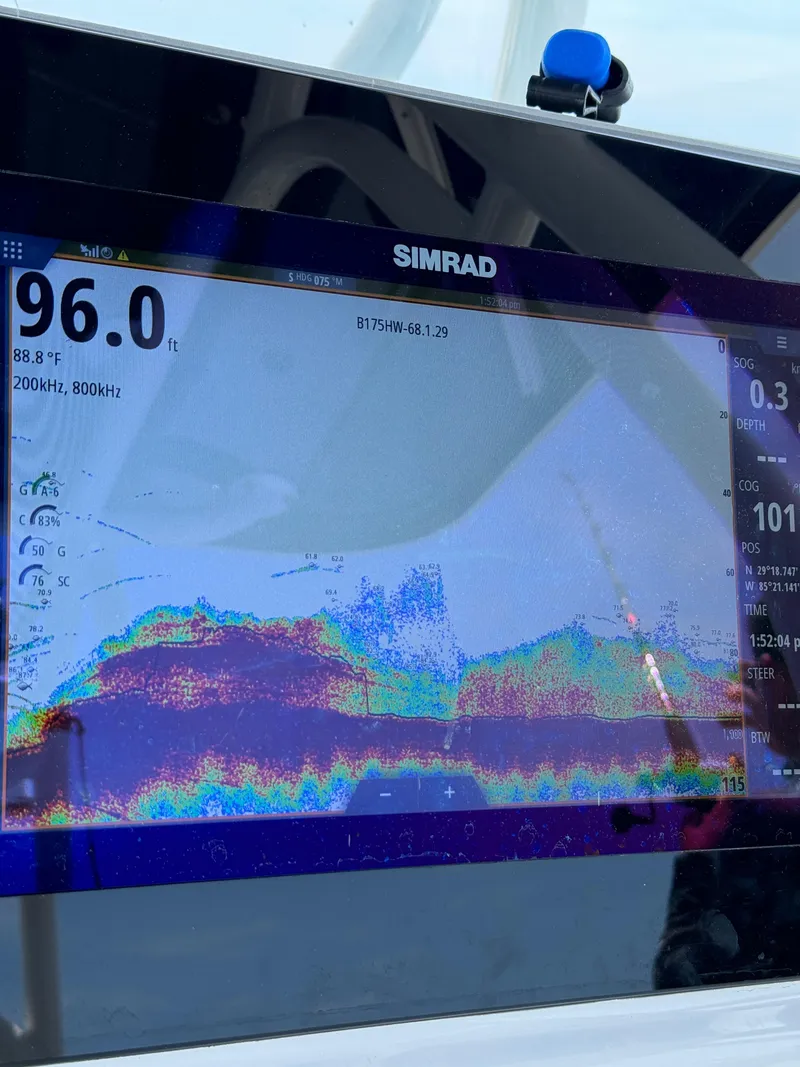 Slide: The Image of Simrad fishfinder display on 2017 Cape Horn 36 XS boat, showing sonar data. - 15