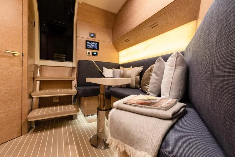 Slide: The Image of Manufacturer Provided Image: Luxurious interior of 2025 Scout 530 LXF yacht with cozy seating and modern decor. - 21