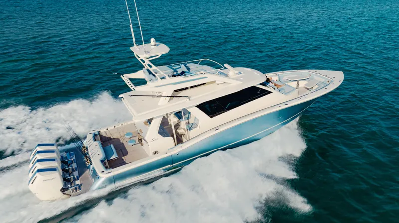 Slide: The Image of 2026 Scout 530 LXF luxury yacht cruising on open water. - 5