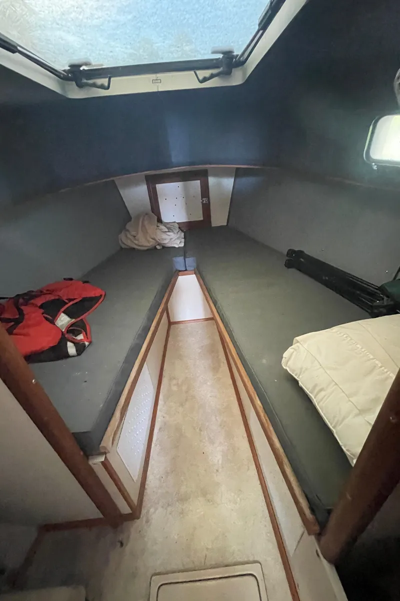 Slide: The Image of 1995 Stuart Angler 33 Downeast boat cabin interior with sleeping quarters. - 8