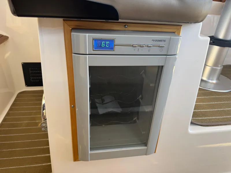 Slide: The Image of Dometic fridge in 2021 Cutwater C-28 boat interior, displaying temperature. - 31
