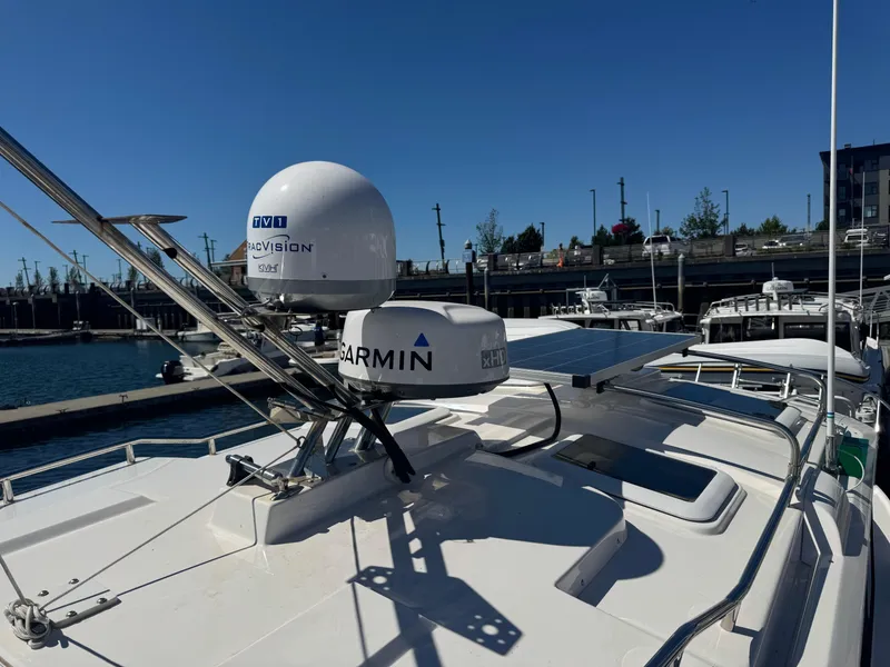 Slide: The Image of 2021 Cutwater C-28 boat with Garmin and KVH equipment on deck, docked at marina. - 42