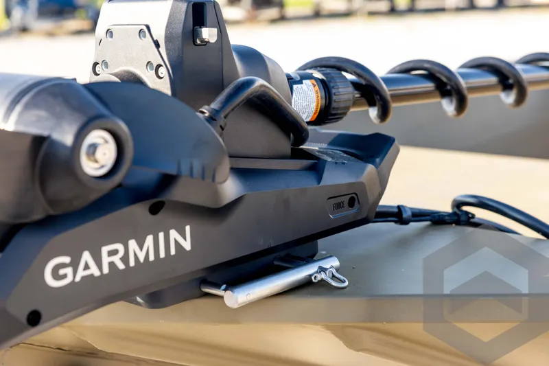 Slide: The Image of Garmin trolling motor on 2025 G3 Gator Tough 1652 VBW boat, close-up view. - 30