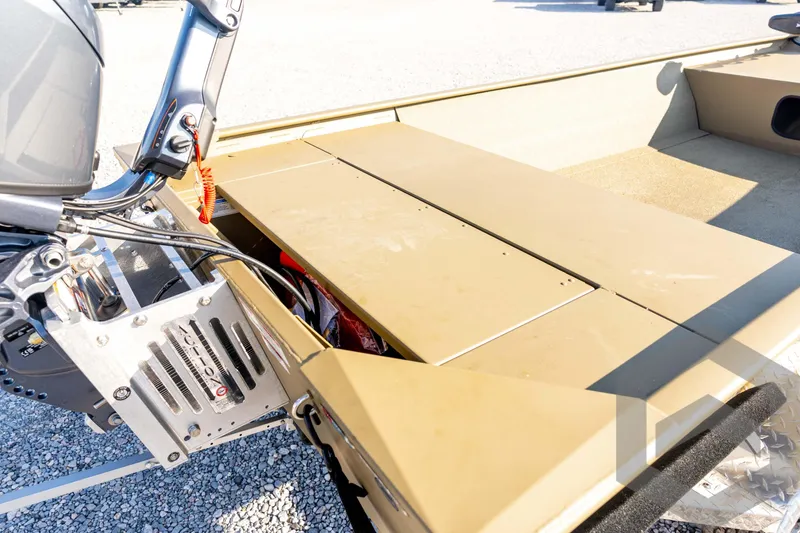 Slide: The Image of 2025 G3 Gator Tough 1652 VBW boat with motor and storage compartment. - 38