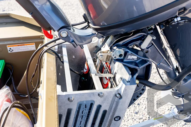 Slide: The Image of 2025 G3 Gator Tough 1652 VBW boat engine and battery compartment close-up. - 41