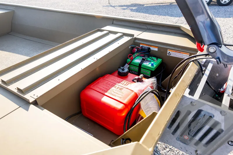 Slide: The Image of 2025 G3 Gator Tough 1652 VBW boat interior with battery and fuel tank. - 42