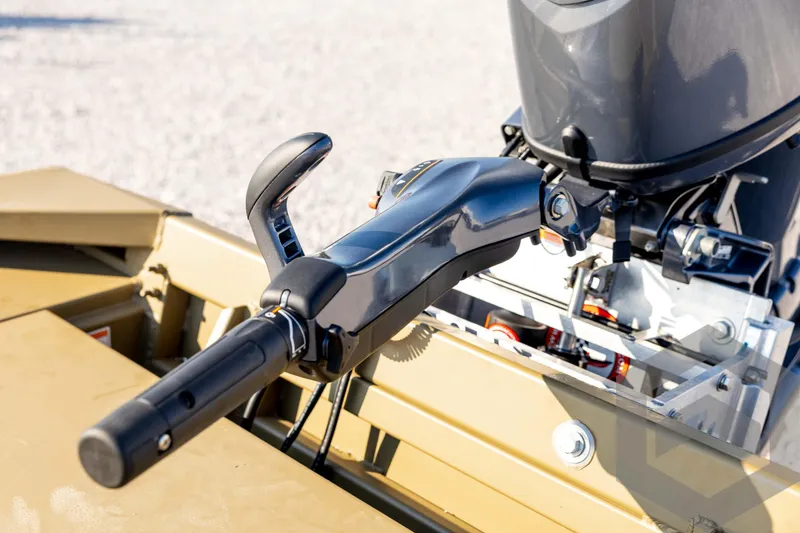 Slide: The Image of 2025 G3 Gator Tough 1652 VBW boat motor control handle, close-up view. - 44