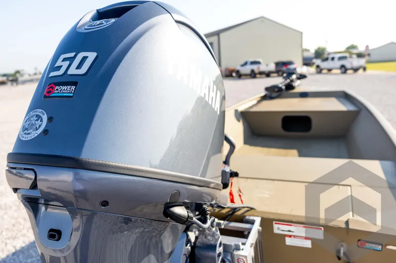 Slide: The Image of 2025 G3 Gator Tough 1652 VBW boat with Yamaha 50 engine in outdoor setting. - 47