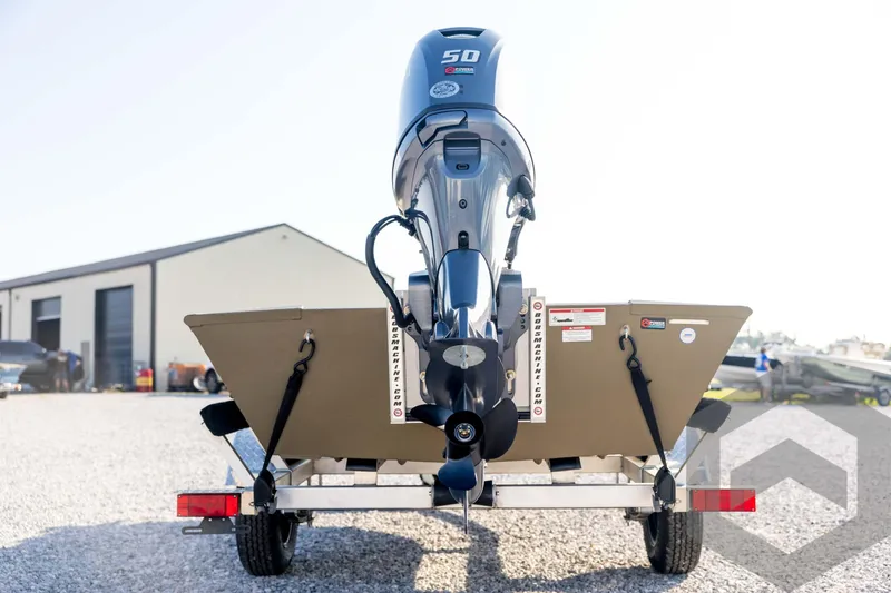 Slide: The Image of 2025 G3 Gator Tough 1652 VBW boat on trailer, rear view with outboard motor. - 6