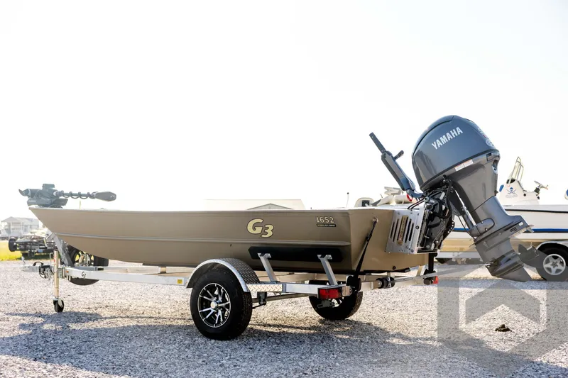 Slide: The Image of 2025 G3 Gator Tough 1652 VBW boat with Yamaha motor on trailer. - 7