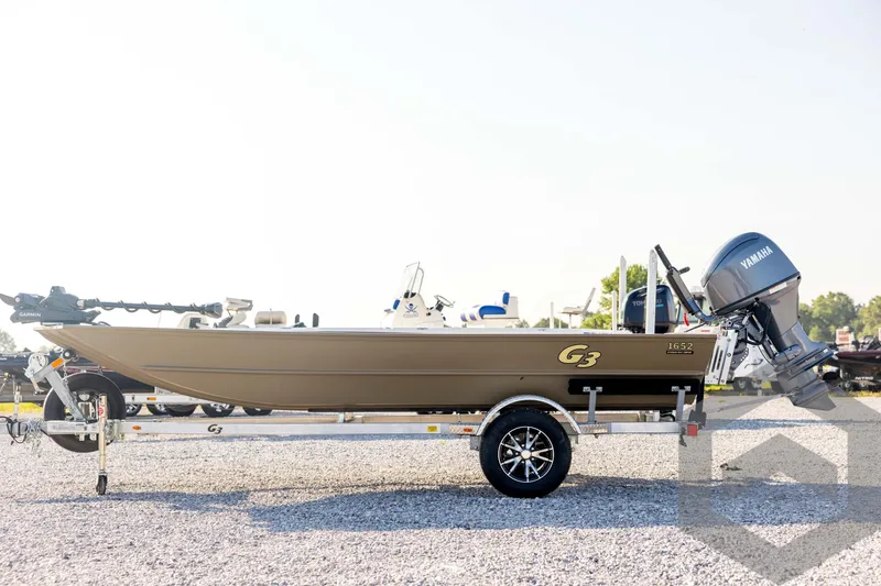 Slide: The Image of 2025 G3 Gator Tough 1652 VBW boat on trailer with Yamaha motor. - 8