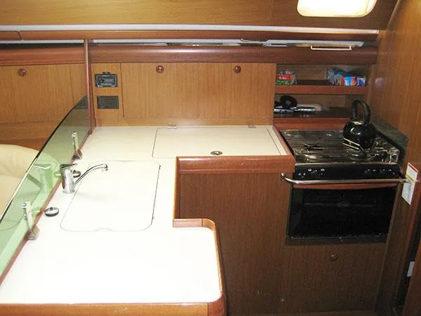 Slide: The Image of Interior of 2006 Jeanneau Sun Odyssey 42 DS yacht kitchen with stove and sink. - 14