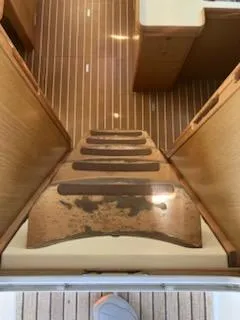 Slide: The Image of Staircase inside 2006 Jeanneau Sun Odyssey 42 DS yacht with wooden flooring. - 3