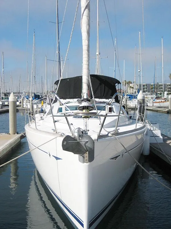 Slide: The Image of 2006 Jeanneau Sun Odyssey 42 DS sailboat docked in marina, front view. - 8