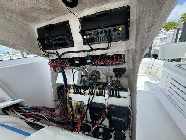 Slide: The Image of Electrical system of a 2008 Pro-Line 32 Express boat, showcasing wiring and control panels. - 7