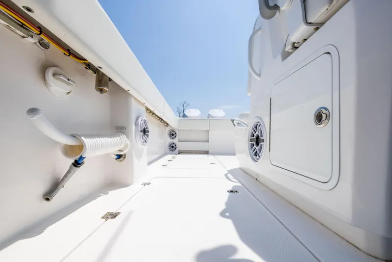 Slide: The Image of 2024 Invincible 37 Catamaran interior, showcasing sleek white design and modern features. - 44