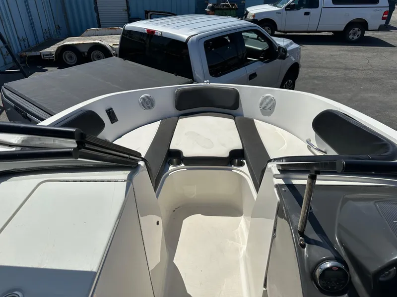 Slide: The Image of 2020 Bayliner VR6 Bowrider OB boat interior with seating and storage compartments. - 11