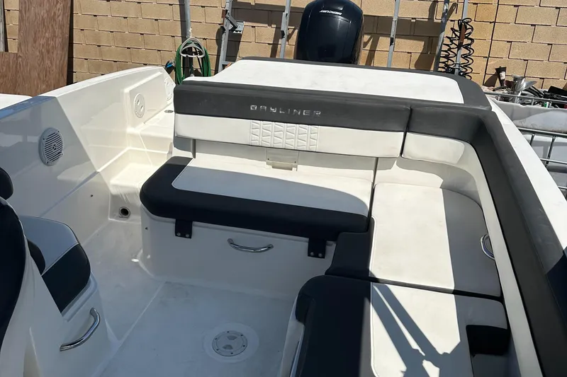 Slide: The Image of 2020 Bayliner VR6 Bowrider OB interior with black and white seating. - 16