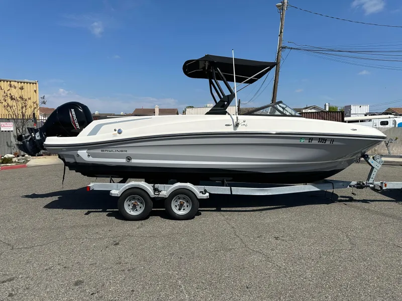 Slide: The Image of 2020 Bayliner VR6 Bowrider OB on trailer in parking lot. - 2