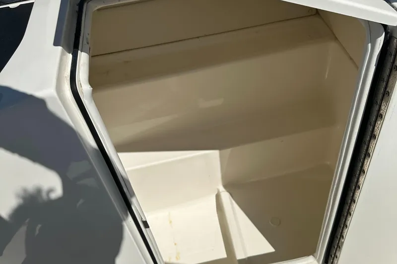 Slide: The Image of 2020 Bayliner VR6 Bowrider OB storage compartment. - 20