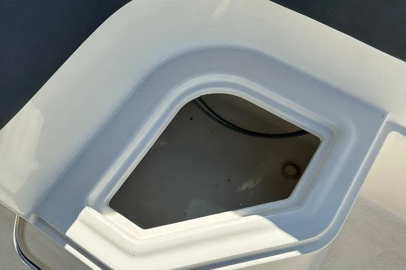 Slide: The Image of 2020 Bayliner VR6 Bowrider OB storage compartment. - 21