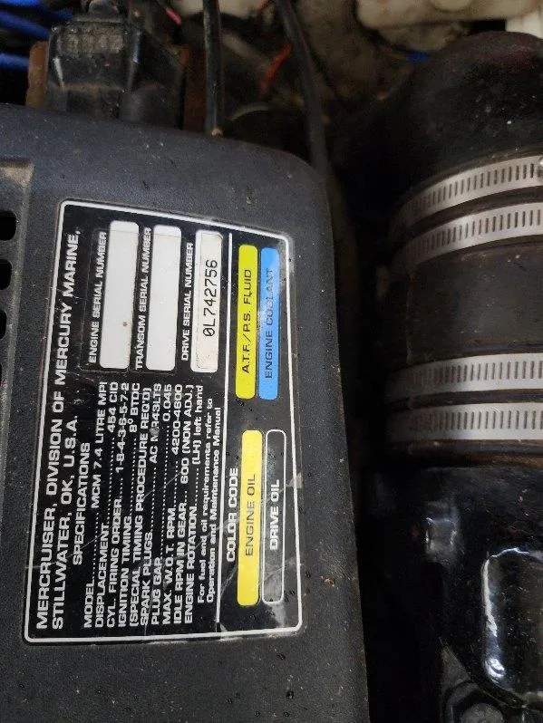 Slide: The Image of Engine label on a 2000 Rinker 270 Express Cruiser, showing specifications and serial numbers. - 20