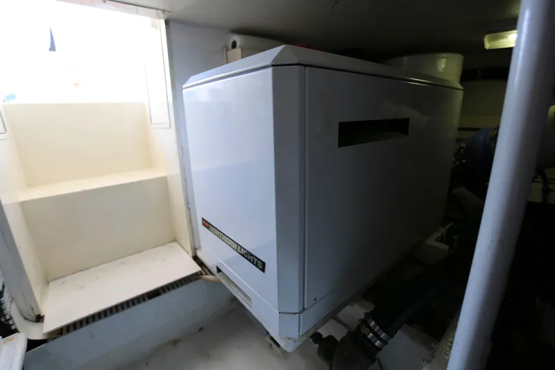 Slide: The Image of Engine room of 1991 Viking 50 Convertible with Northern Lights generator. - 49