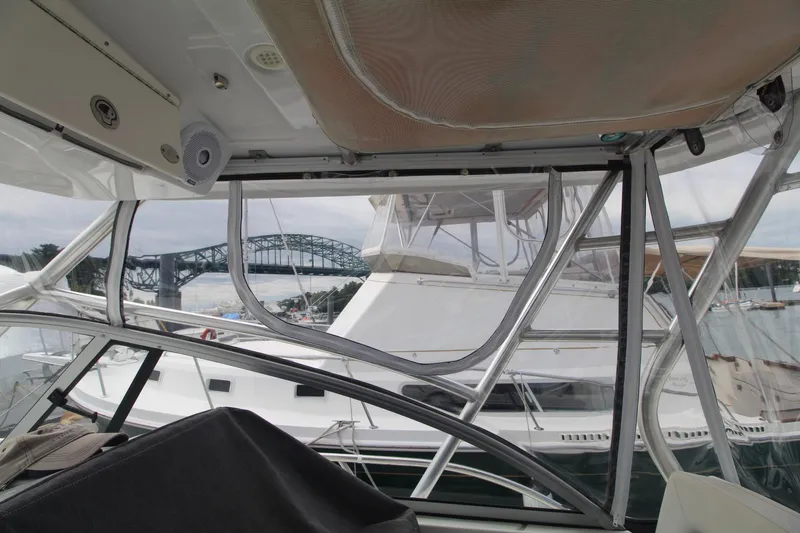 Slide: The Image of 2007 Sailfish 3006 WALKAROUND boat interior with marina and bridge view. - 14