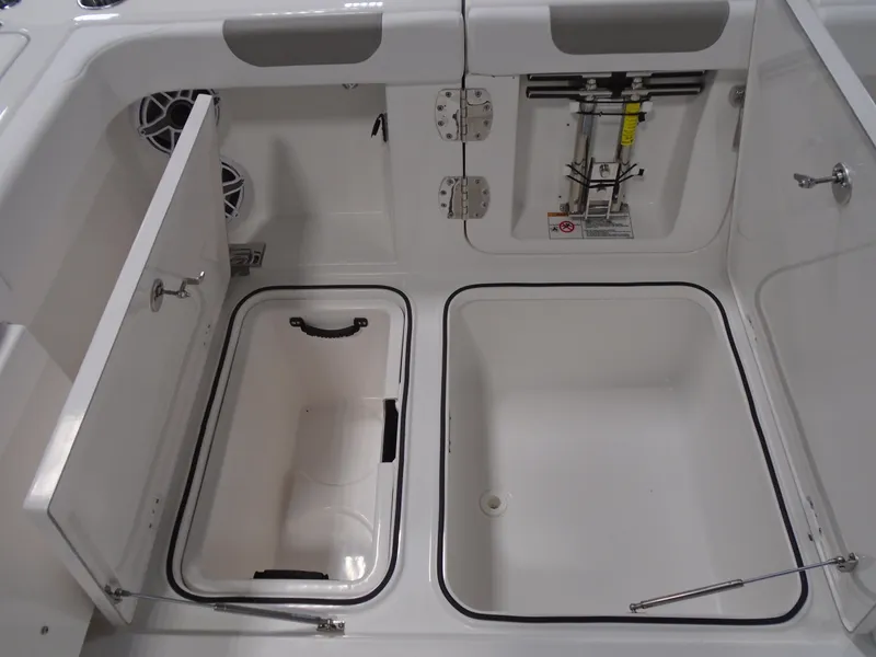 Slide: The Image of 2026 Caymas 34 CT boat storage compartments and hatch details. - 21