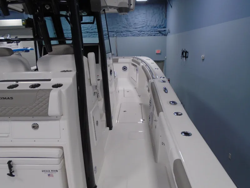 Slide: The Image of 2026 Caymas 34 CT boat interior with sleek design and modern features. - 26