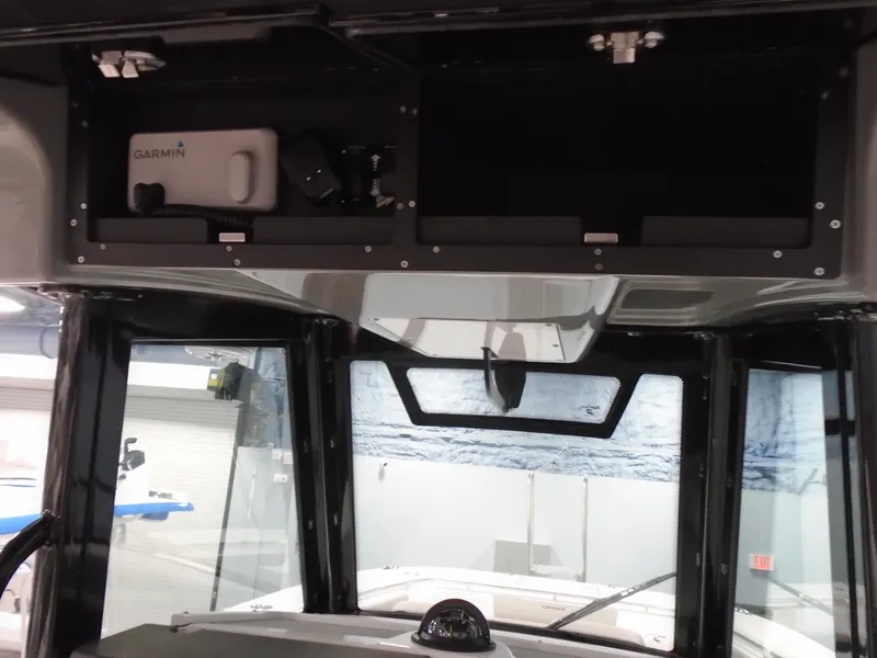 Slide: The Image of Interior view of 2026 Caymas 34 CT boat with Garmin equipment. - 31