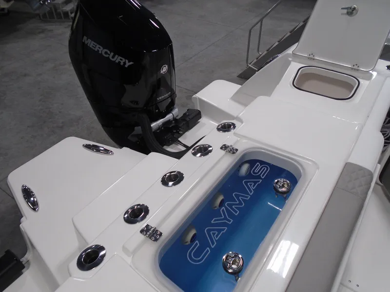 Slide: The Image of 2026 Caymas 34 CT boat with Mercury engine, featuring sleek design and modern amenities. - 47