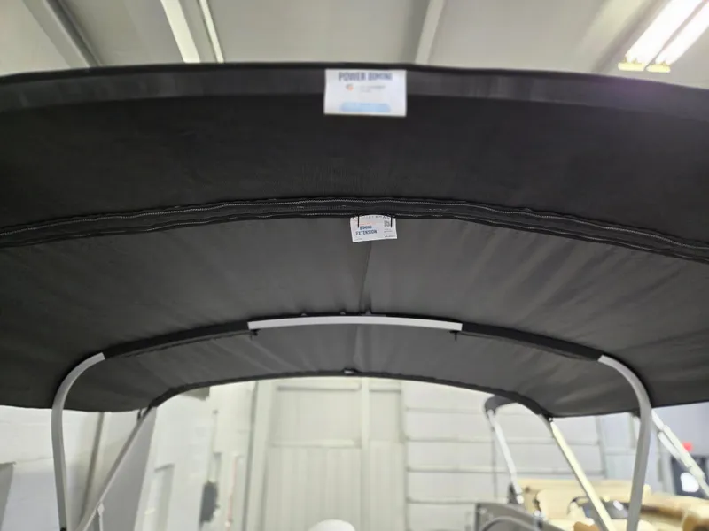 Slide: The Image of 2025 Princecraft Vectra 23 WRL boat canopy in a showroom setting. - 20