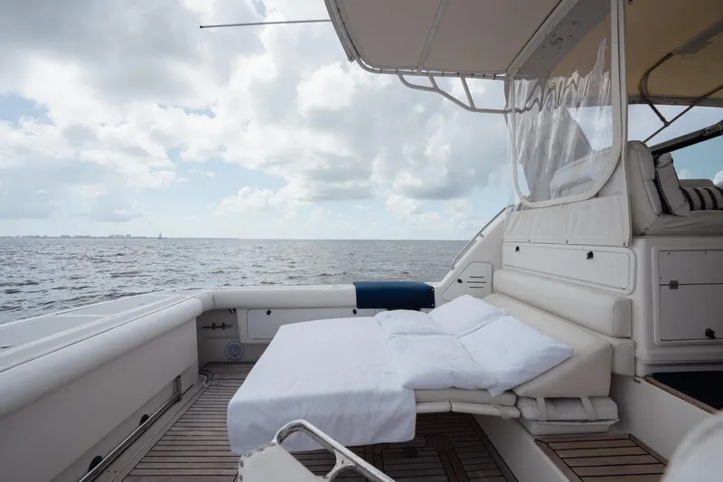 Slide: The Image of 1998 Tiara Yachts 4300 Open with luxurious deck seating and ocean view. - 29