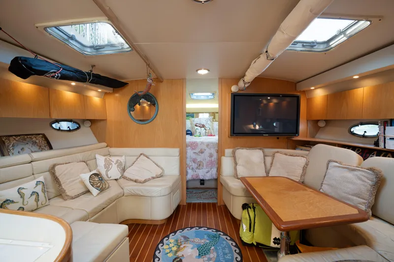 Slide: The Image of Luxurious interior of 1998 Tiara Yachts 4300 Open with plush seating and modern amenities. - 43