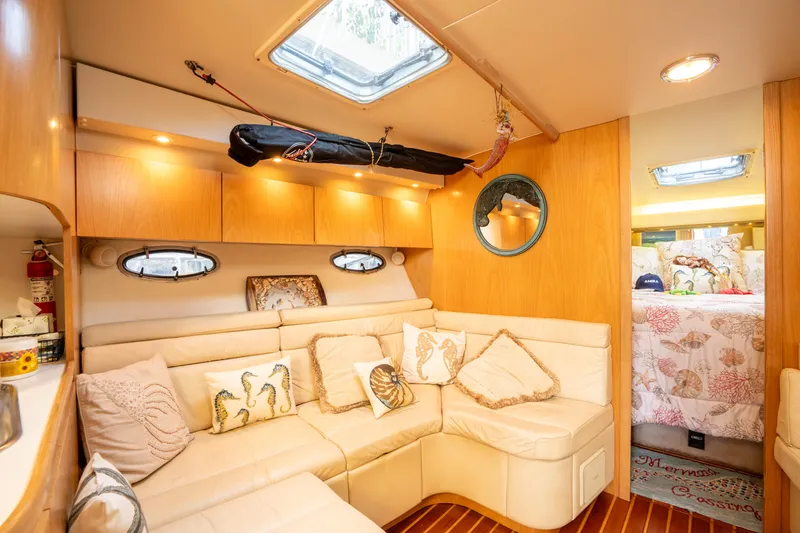 Slide: The Image of Luxurious interior of 1998 Tiara Yachts 4300 Open with cozy seating and elegant decor. - 45