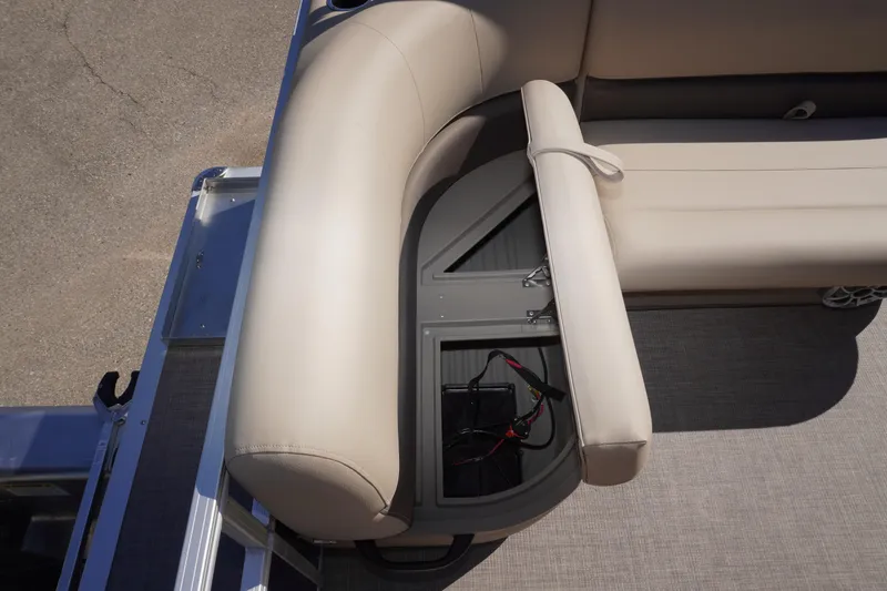 Slide: The Image of 2025 Sun Tracker Bass Buggy 16 XL Select boat seat with storage compartment open. - 13