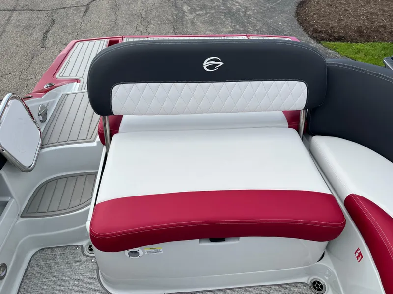 Slide: The Image of 2026 Crownline 298 SS boat seat with red and white upholstery, diamond stitching. - 24