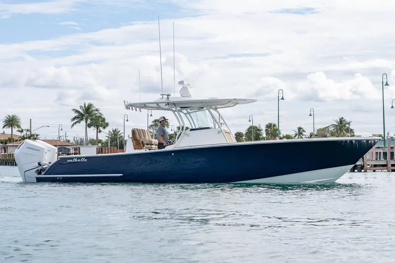 The Image of 2026 Valhalla Boatworks V-33 cruising on calm waters, side view. - 0