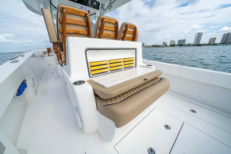 Slide: The Image of 2026 Valhalla Boatworks V-33 interior with luxurious seating and ocean view. - 10
