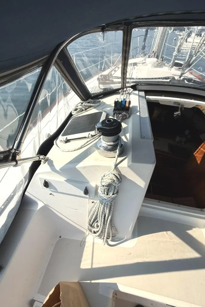 Slide: The Image of Cockpit of 1986 Pearson 33-2 sailboat with winch and ropes. - 14