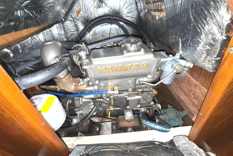 Slide: The Image of Engine compartment of a 1986 Pearson 33-2 sailboat with Yanmar engine. - 30