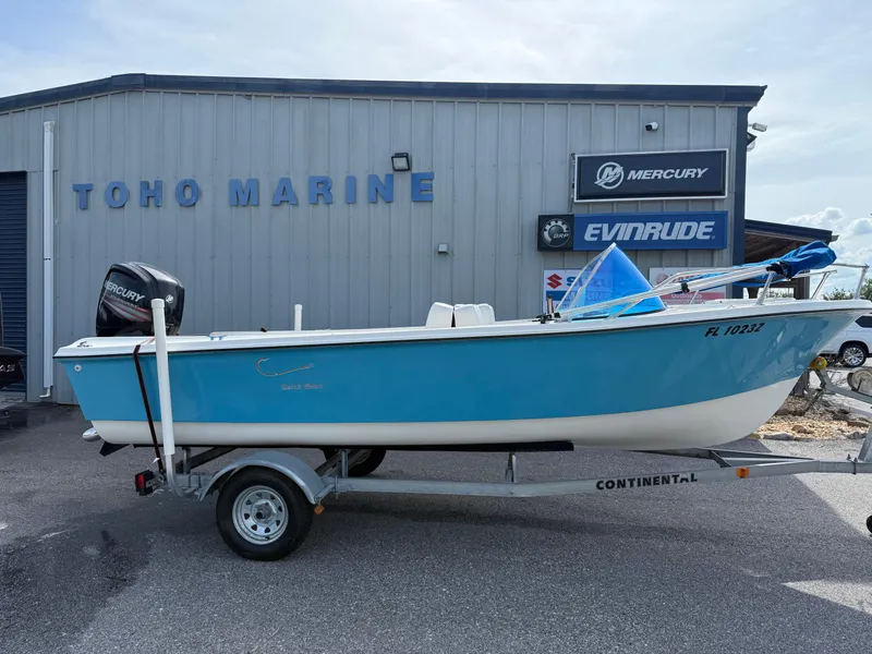 The Image of 1963 T Craft VHULL boat on trailer at Toho Marine dealership. - 1
