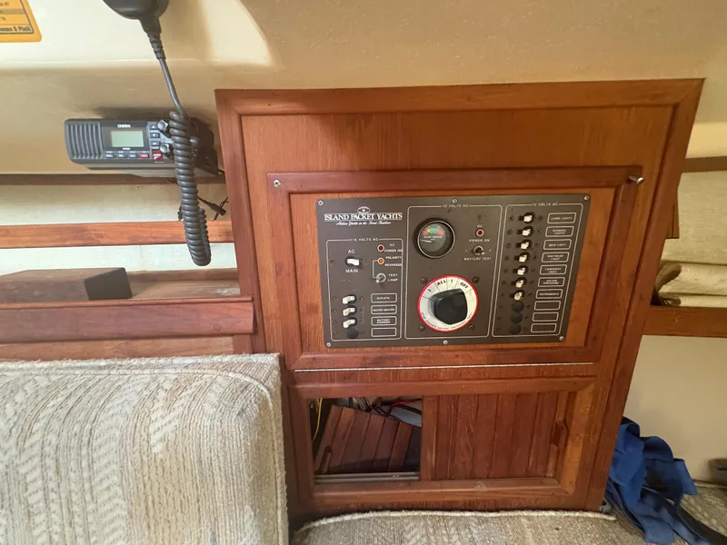 Slide: The Image of Control panel of a 1986 Island Packet IP27 Cutter yacht interior. - 26