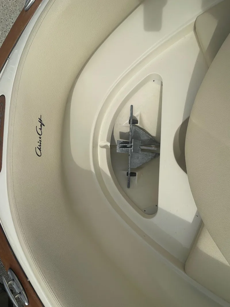 Slide: The Image of 2020 Chris-Craft Launch 23 boat interior with anchor storage compartment. - 26