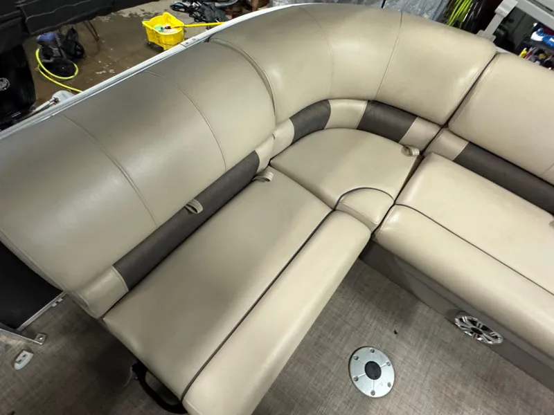 Slide: The Image of 2023 Sun Tracker Party Barge 20 DLX, beige seating, spacious and comfortable design. - 13