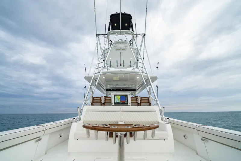 Slide: The Image of 2026 Valhalla Boatworks V-55 yacht with fishing tower on open sea. - 12